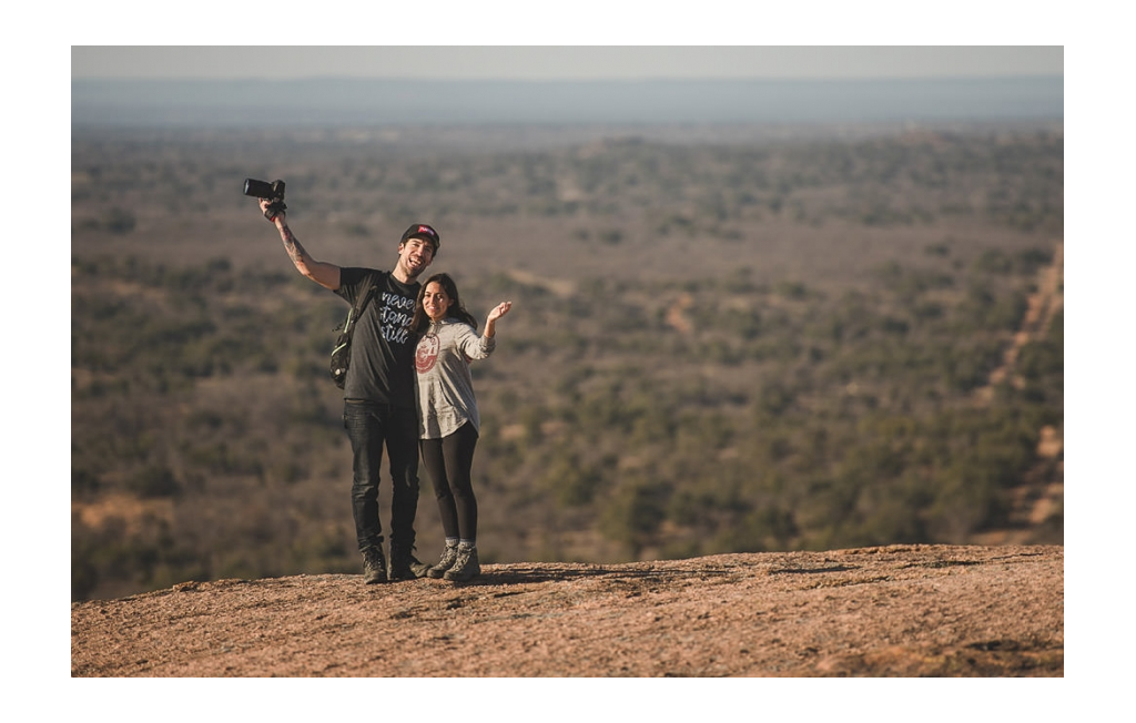Nadia and Jon posing outside at night at the RVE Summit