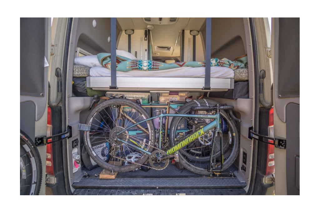 Exterior rear view of Winnebago Revel power lift bed and gear garage