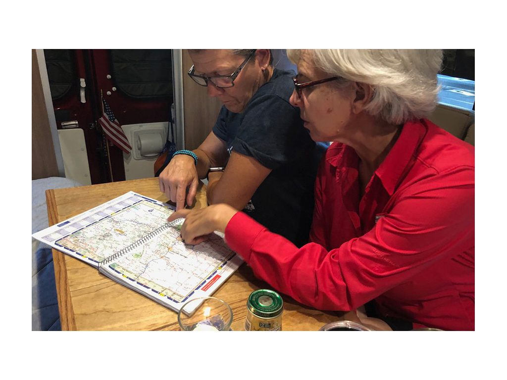 Chris and Noel looking at a map