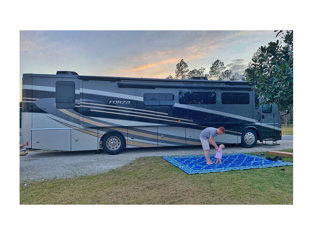 Heath and Ellie playing outside of the Forza