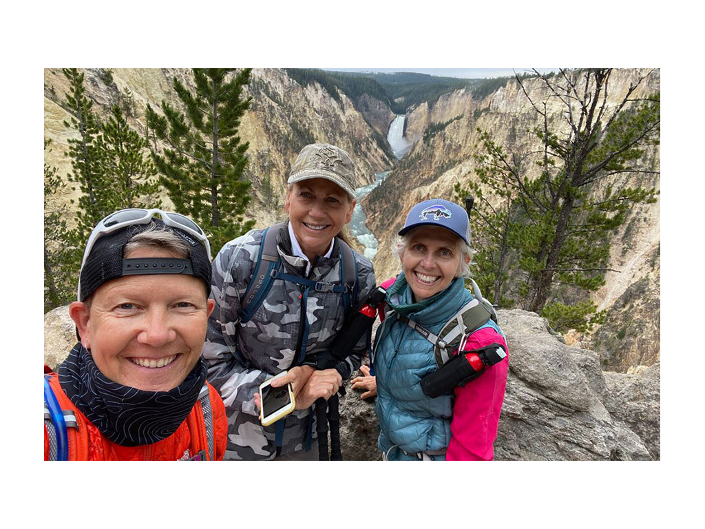 Chris and Noel hiking with a friend