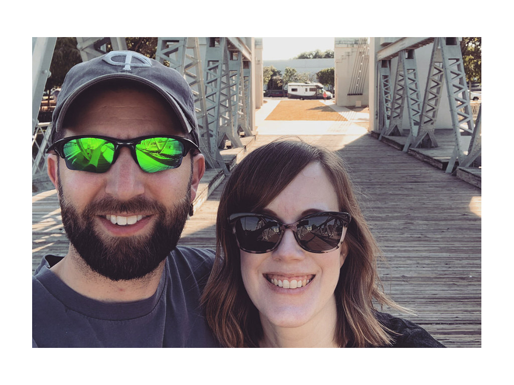 Lindsey and Dan taking selfie on bridge in Waco, Texas