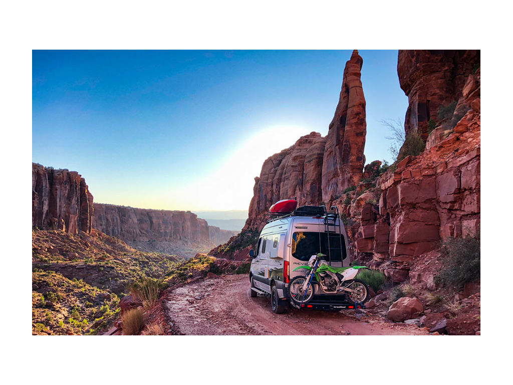 Revel driving off-road in mountains