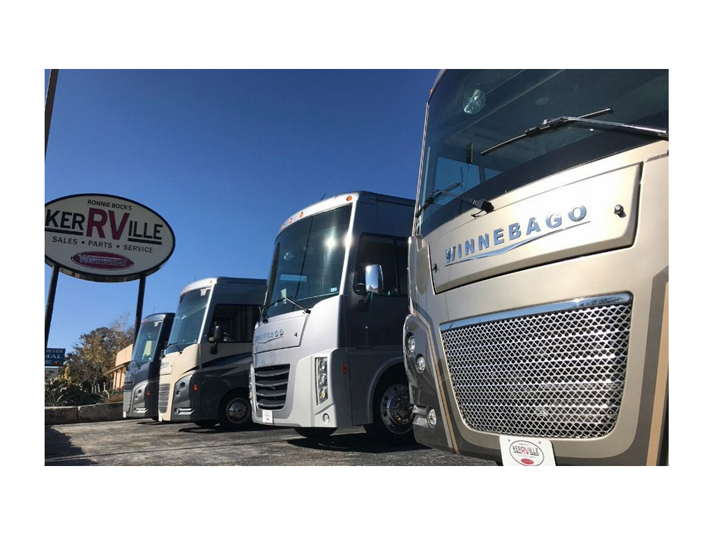 Winnebago Class A motorhomes lines up at dealership