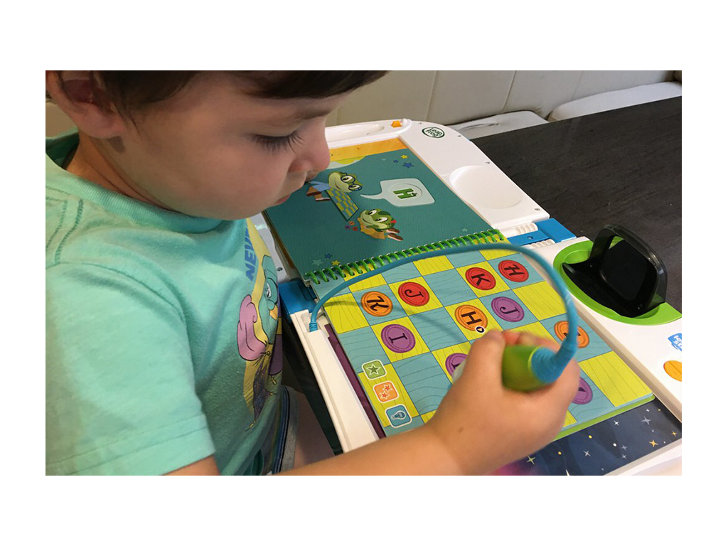 Caspian doing a LeapStart activity