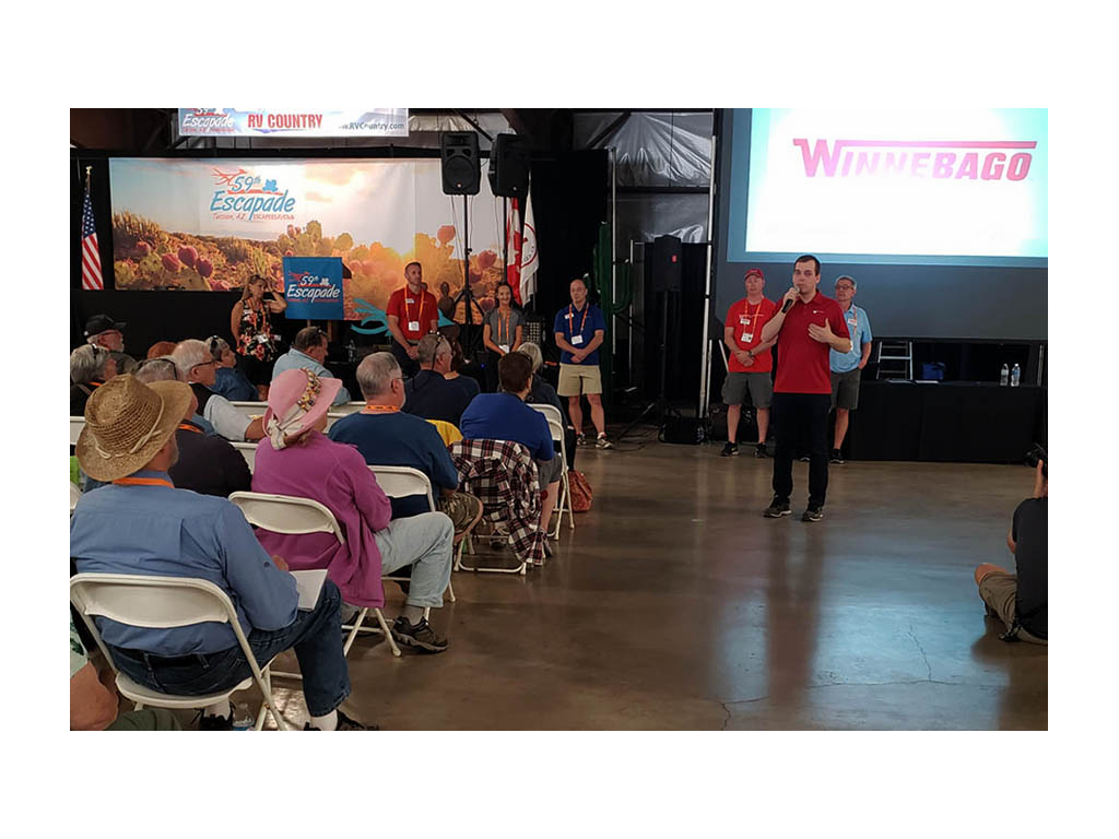 Nick Davis from Winnebago giving presentation to crowd during Escapade