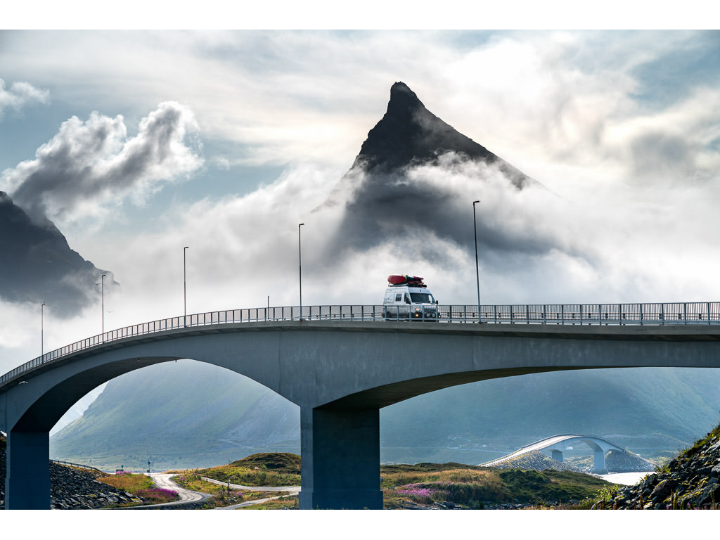 Winnebago Revel driving across a bridge