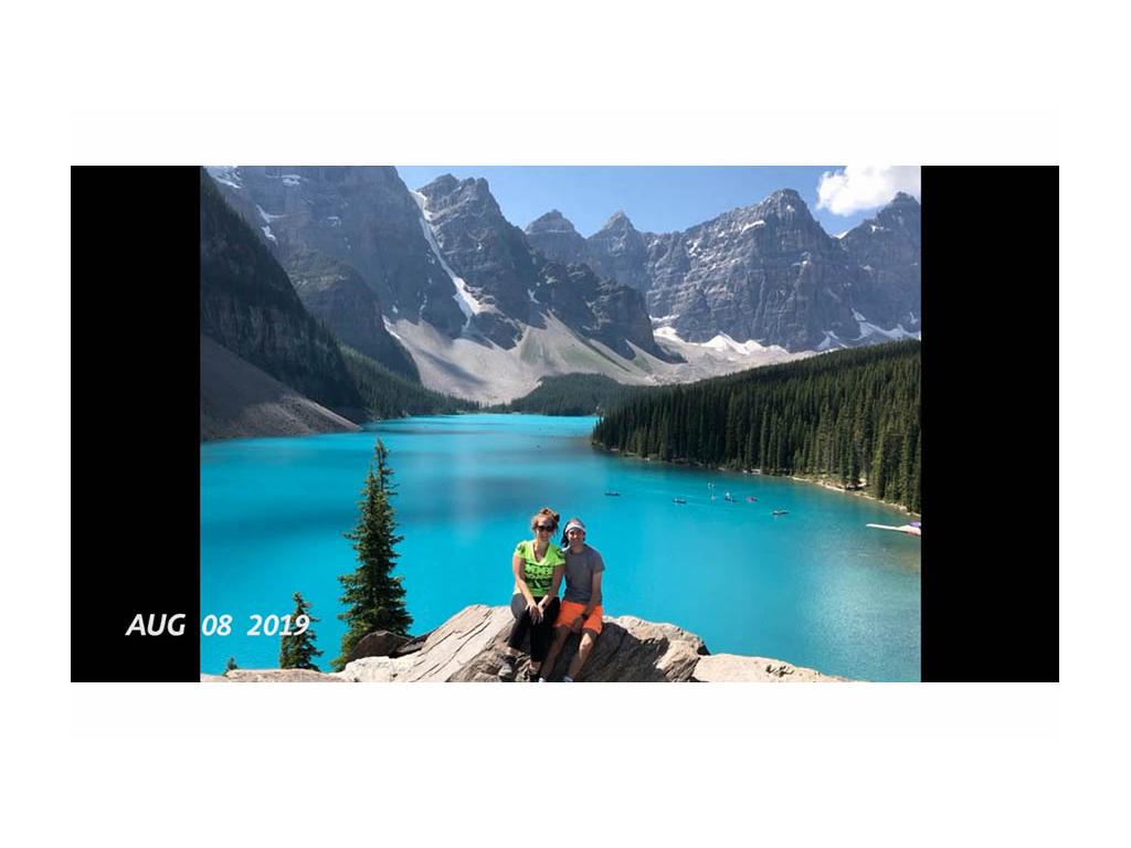 Shanae & Mark with lake and mountains in the background