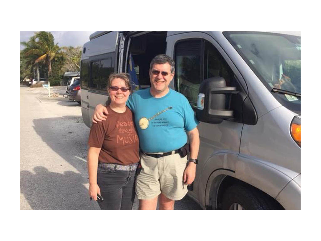 Faith and Daniel standing together in front of Travato