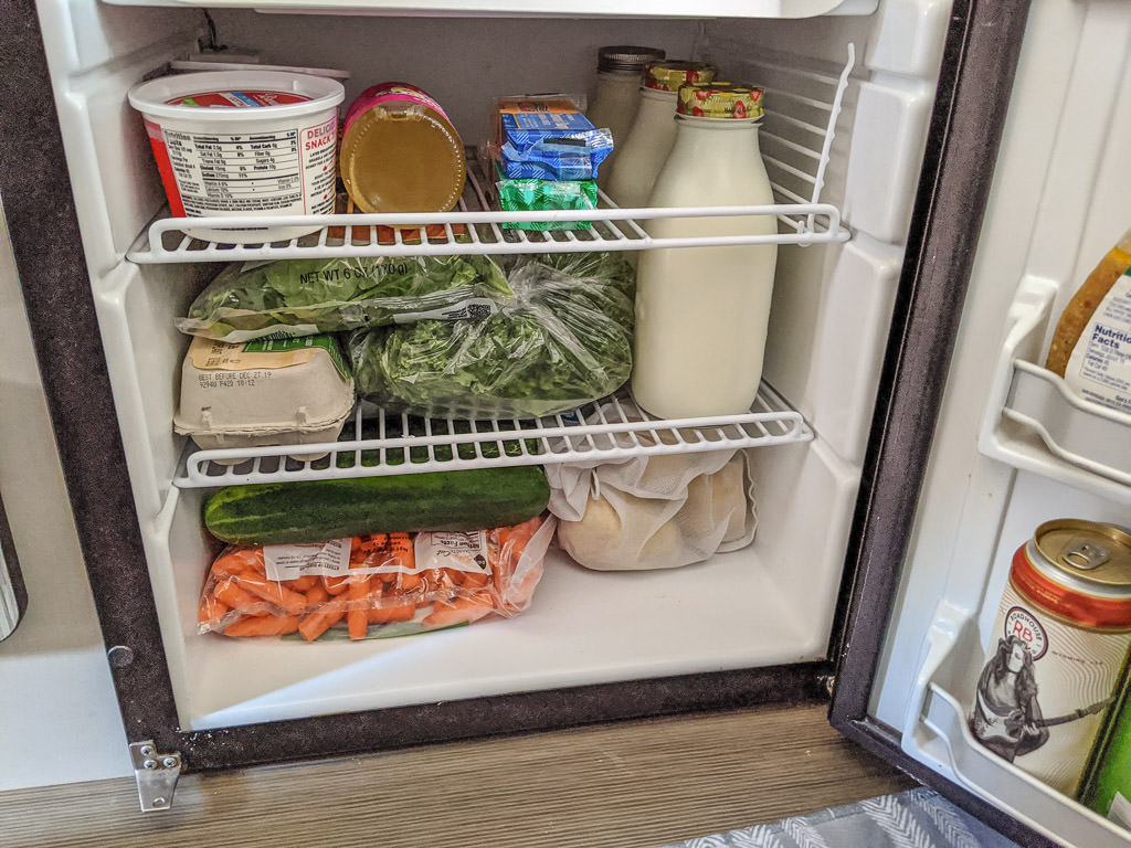 Revel refrigerator full of food