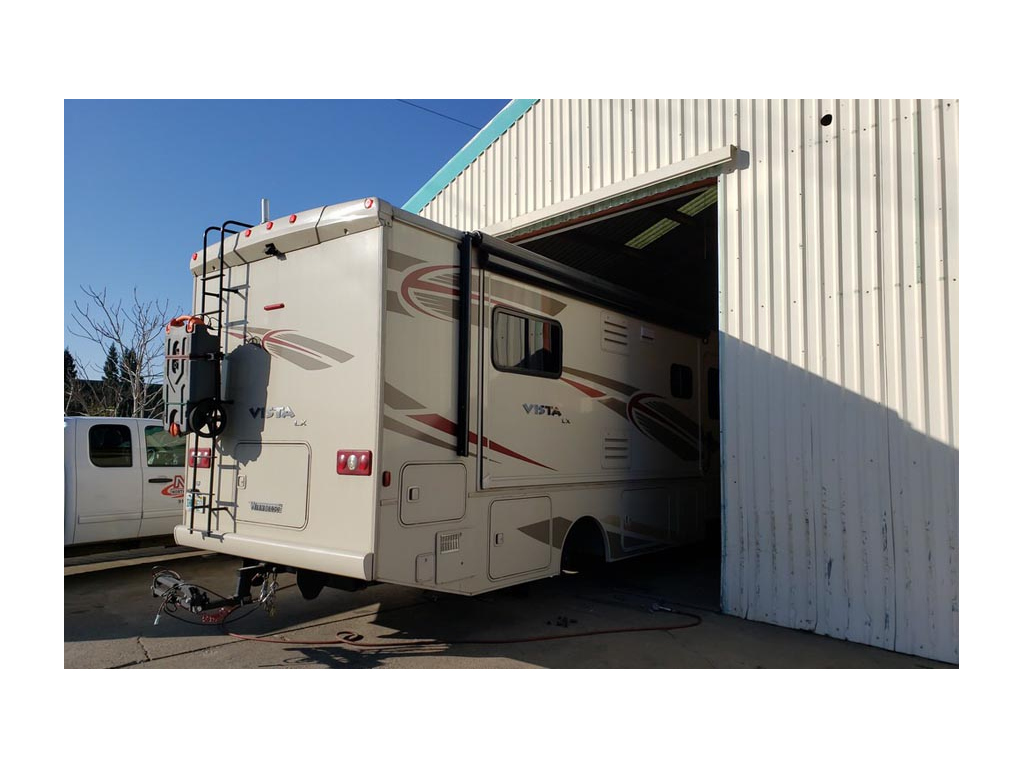 Vista going into service bay for new tires