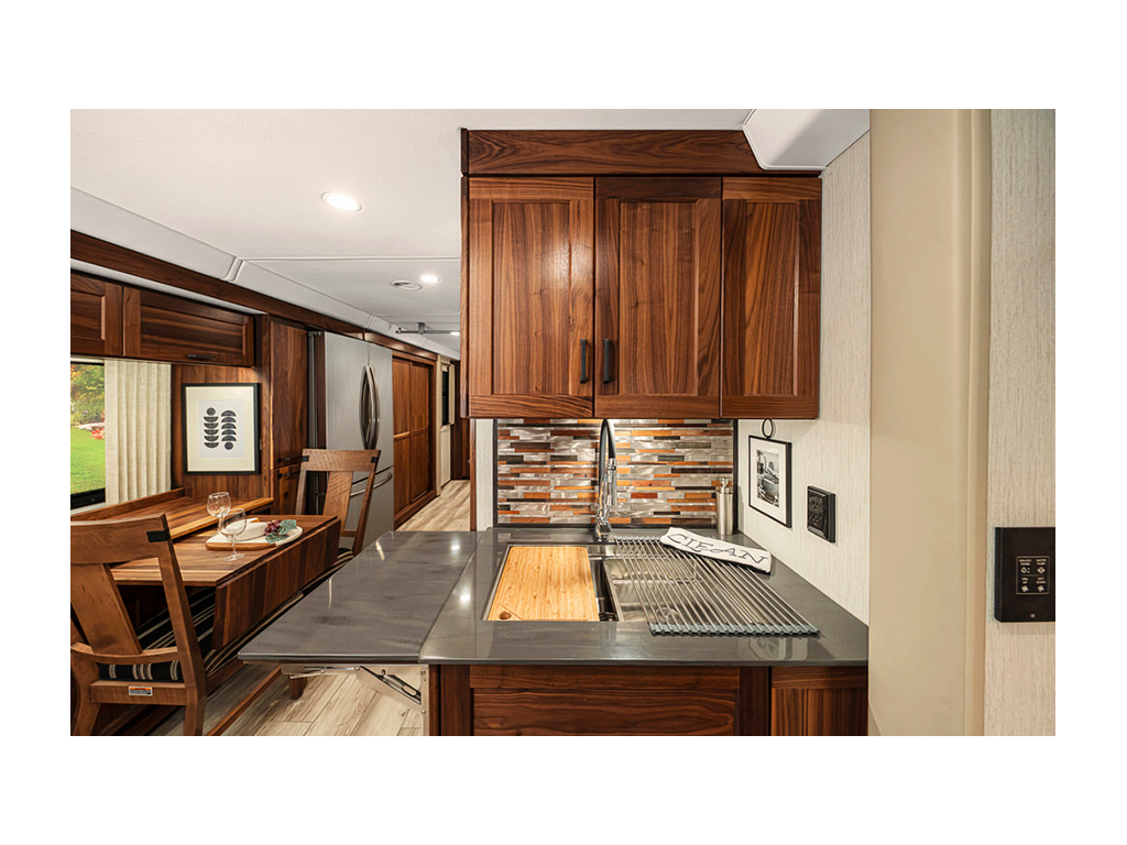 Kitchen sink and table in the Winnebago Journey