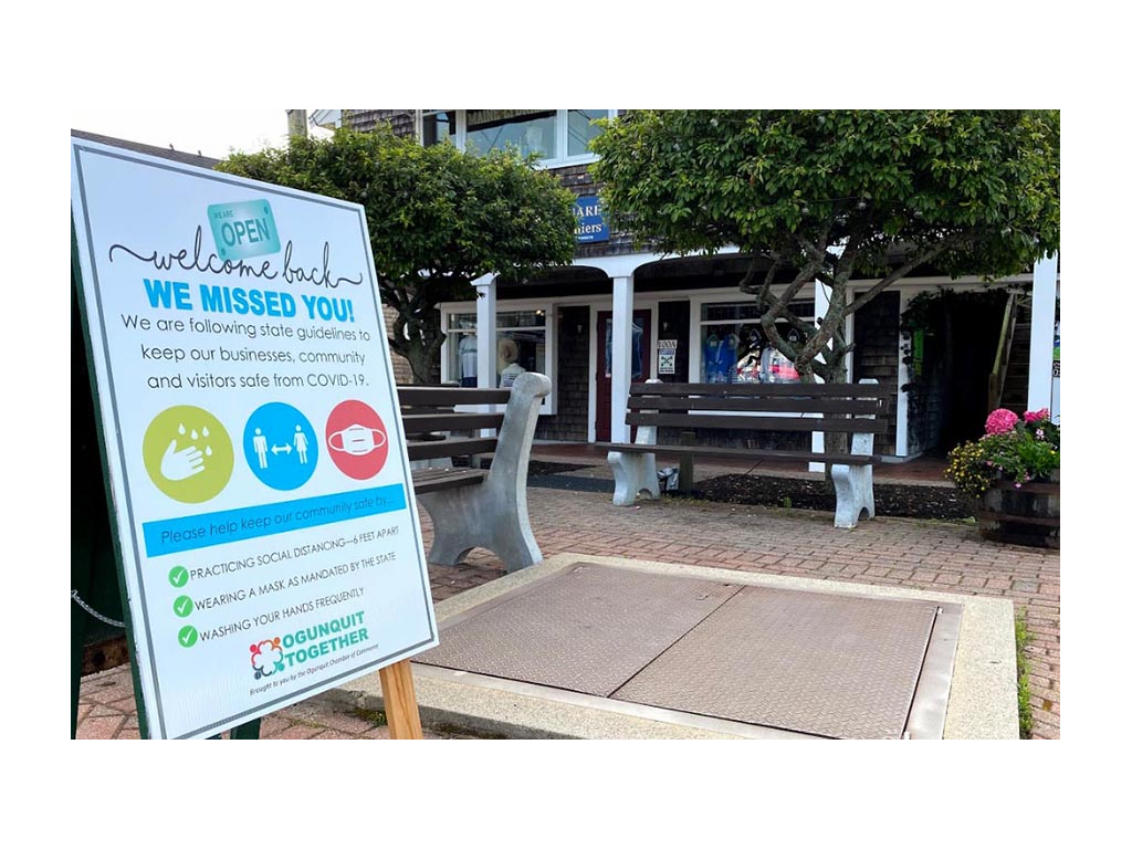 COVID-19 sign outside of shops in Maine