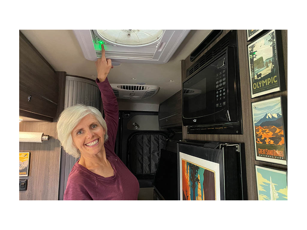 Chris pointing to power button on Maxxair fan