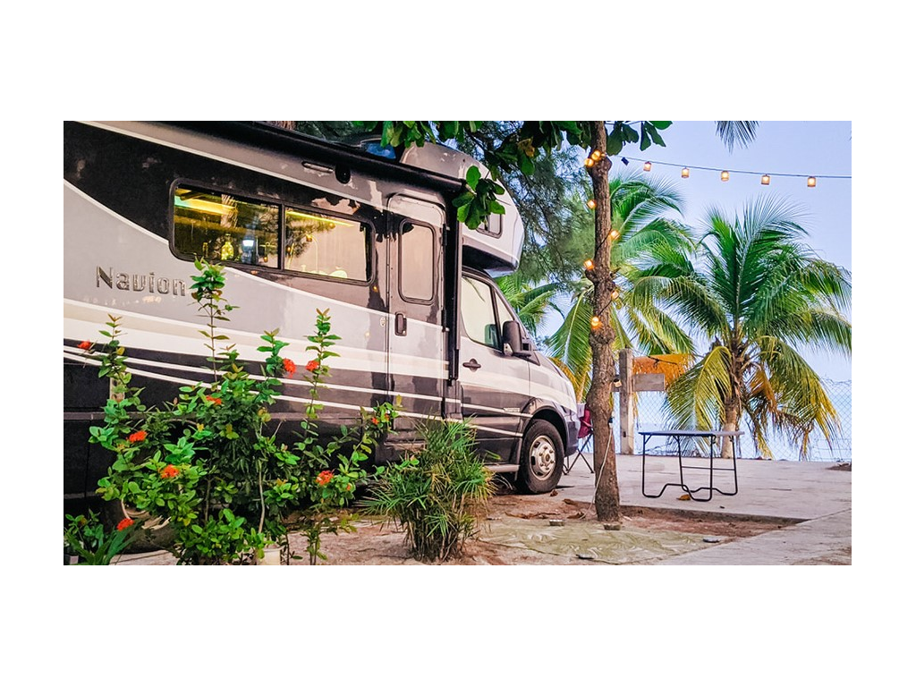 Navion parked on beach in Mexico