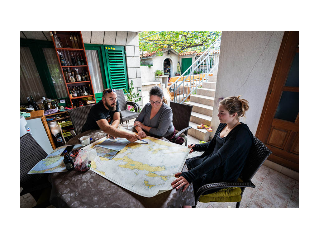 Abby and Kathy planning route with Jogi from Sea Kayak Croatia