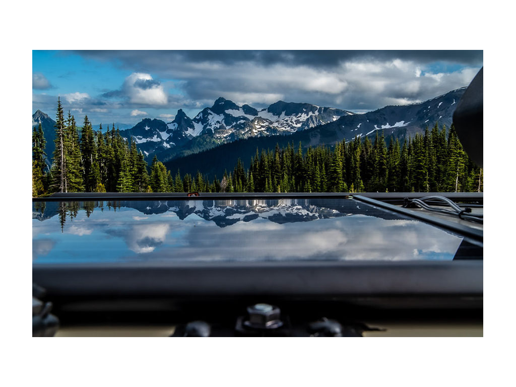 Rainier mountains reflecting off of solar panels
