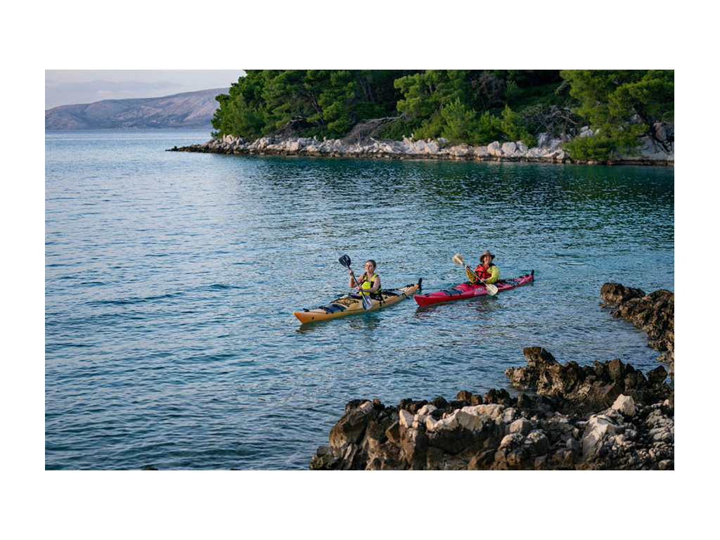 Abby and Kathy kayaking in Croatia
