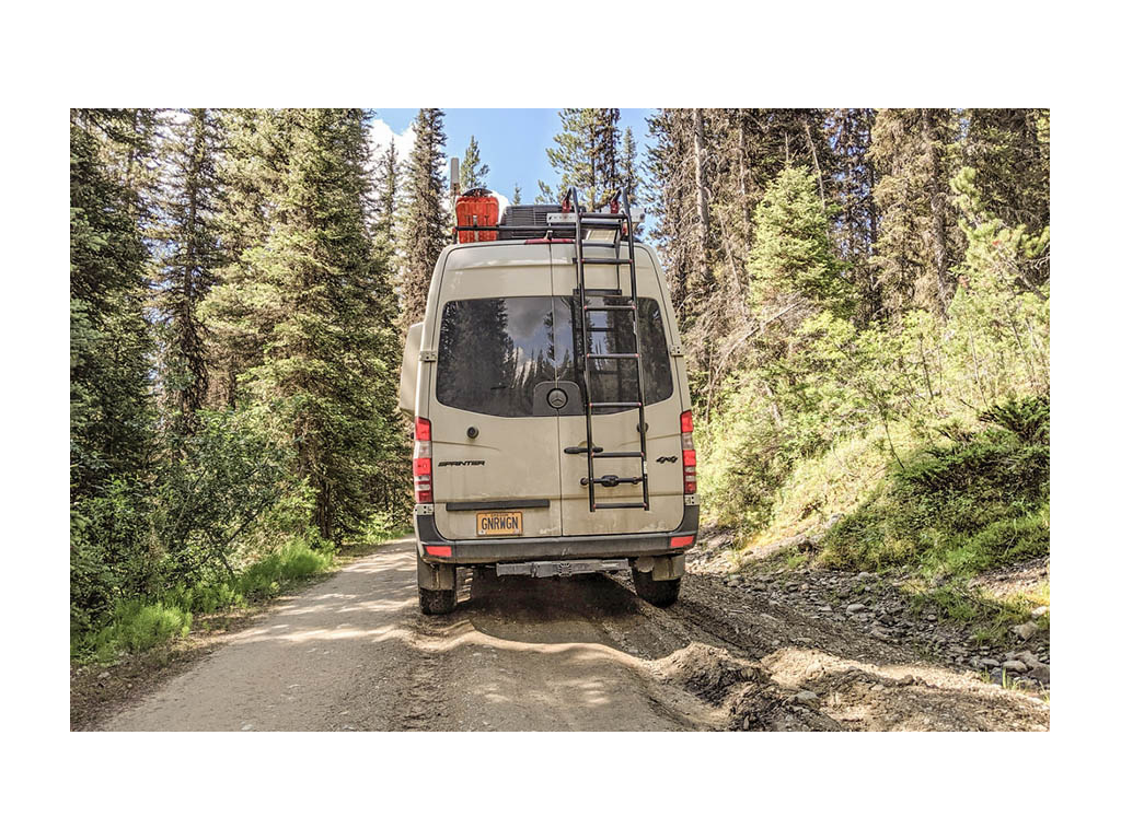 Winnebago Revel driving down dirt road