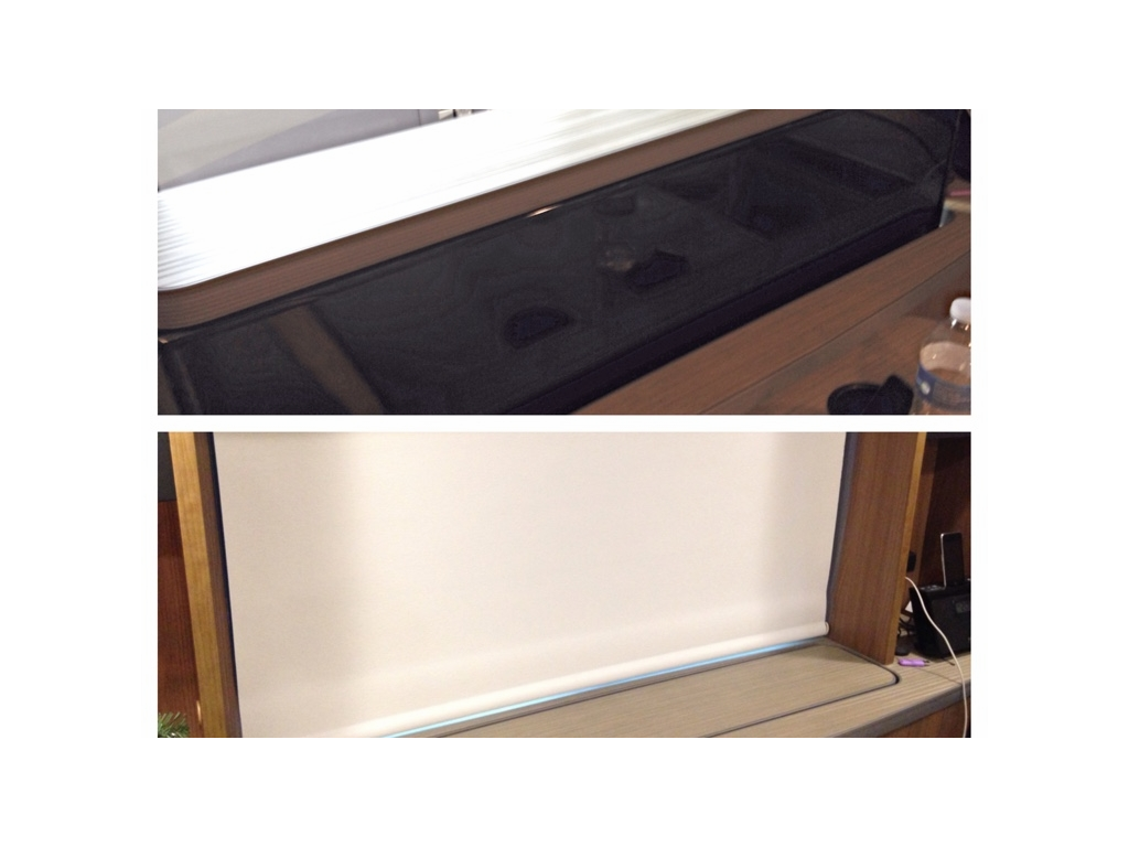 TV rising up from the counter.