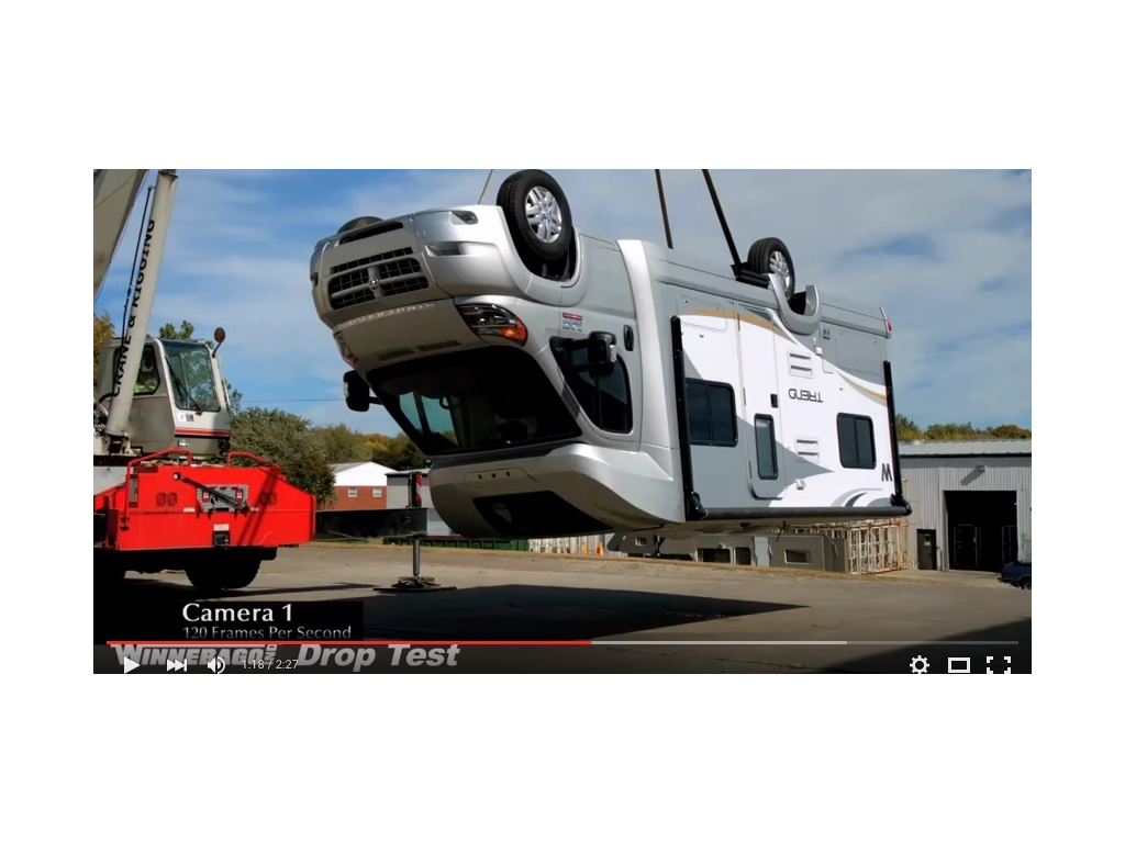 Winnebago Trend hanging upside down about to be drop tested.