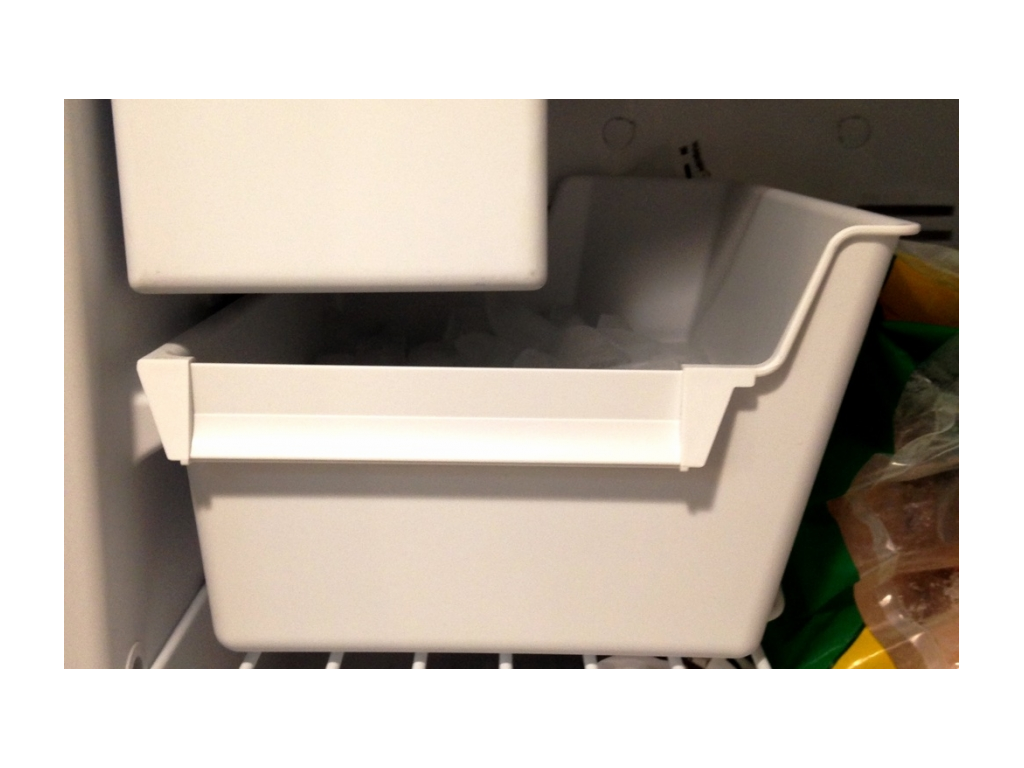 Ice maker in the freezer.
