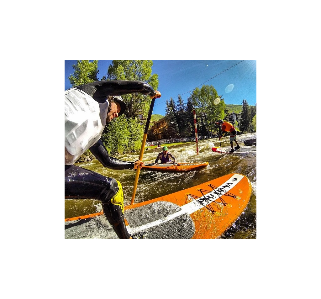 People on paddleboards in the water.