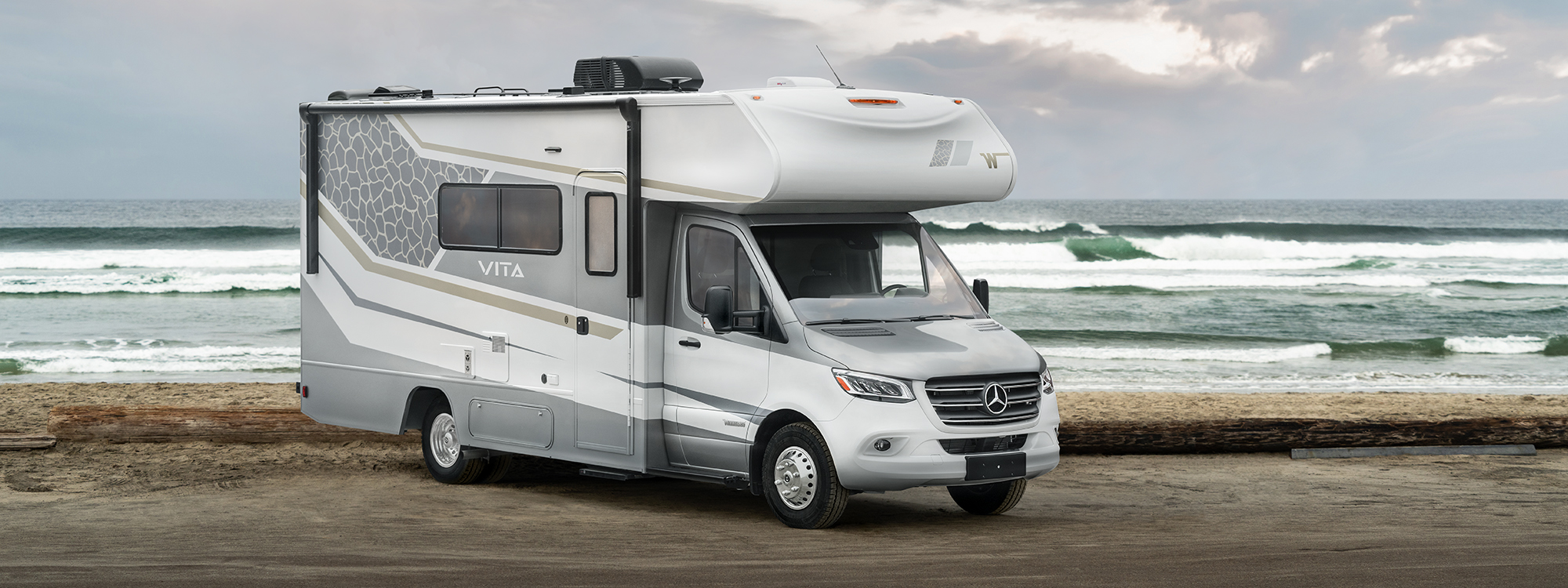 winnebago vita parked with a scenic background