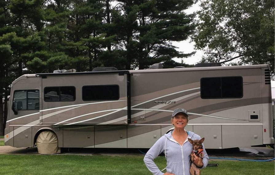 Lin holding Wally in front of Forza