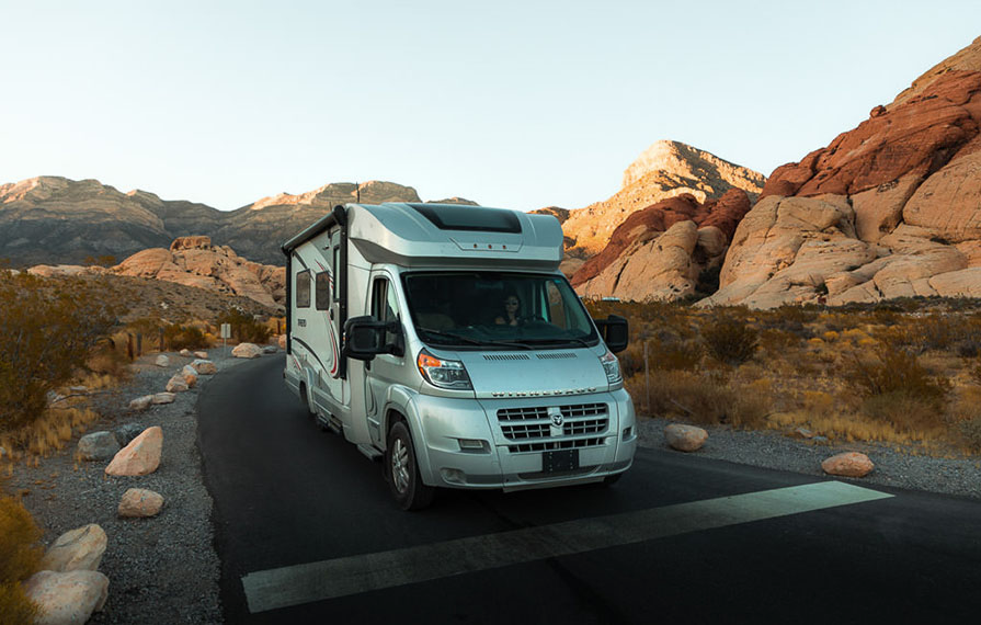 Trend driving down road in Nevada