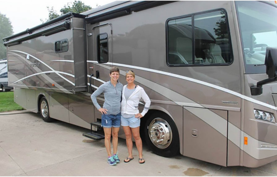 Ann and Lin standing in front of Forza