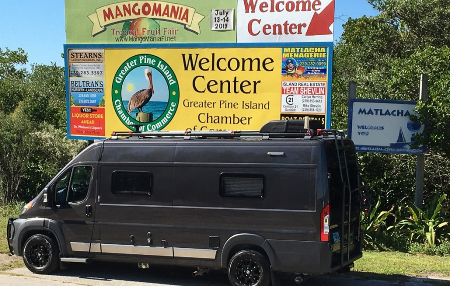 Travato in front of Matlacha Welcome Center sign