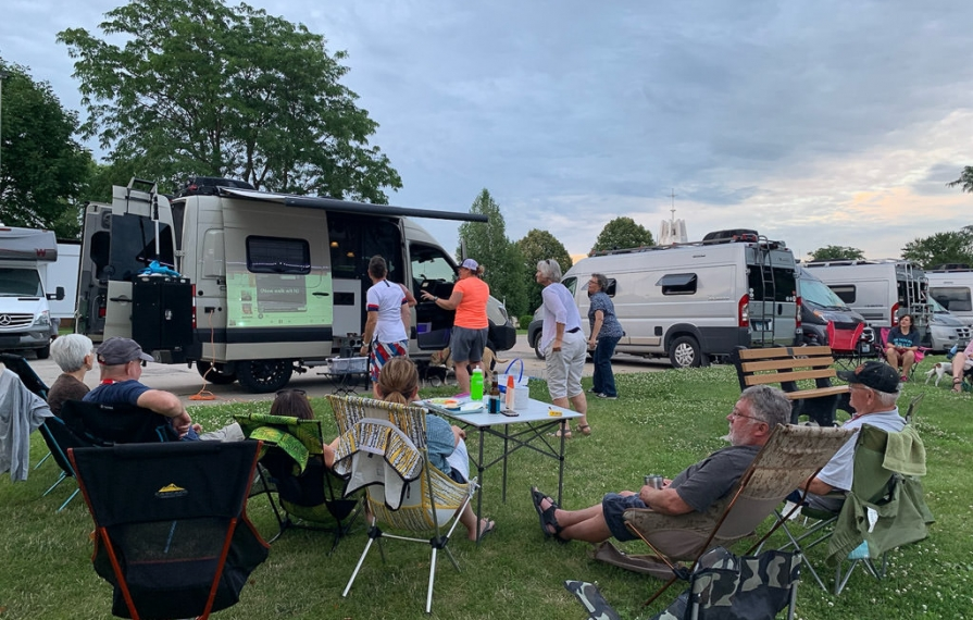 Winnie Bs gathered around a Revel ringing karaoke