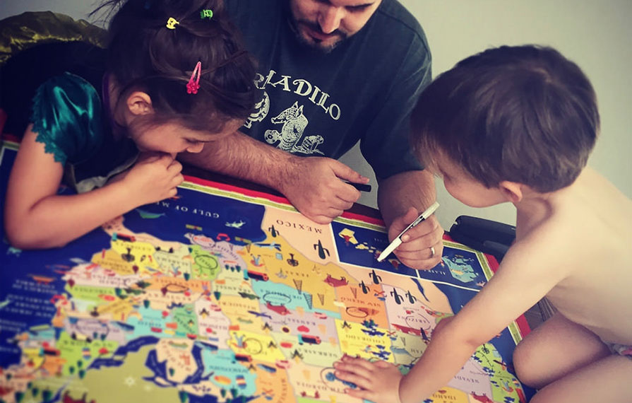 David and the kids looking at map