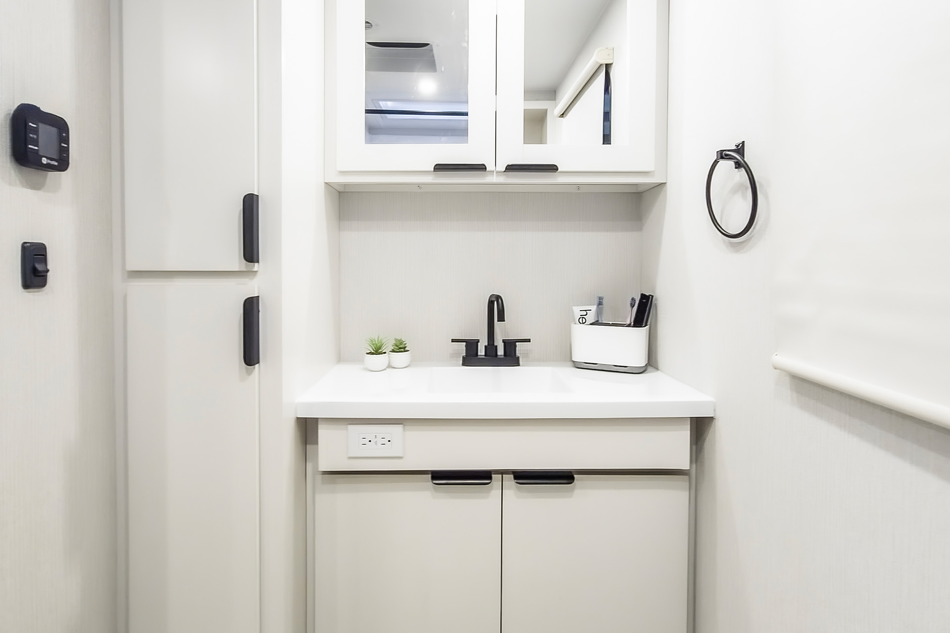 2026 Winnebago Thrive 22RBS — Close up of bathroom vanity inside Thrive 22RBS