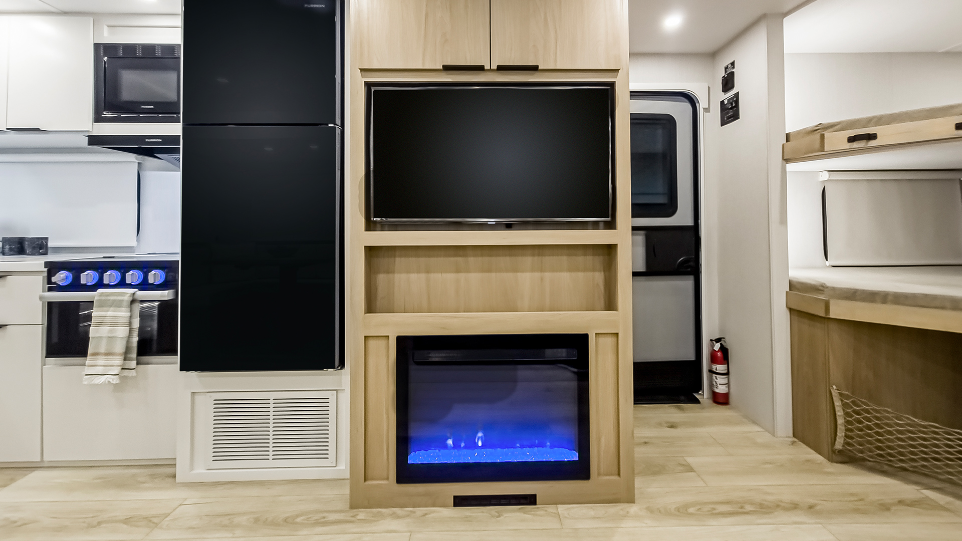 2026 Winnebago Thrive 28BHS — TV and Fireplace in Thrive 28BHS