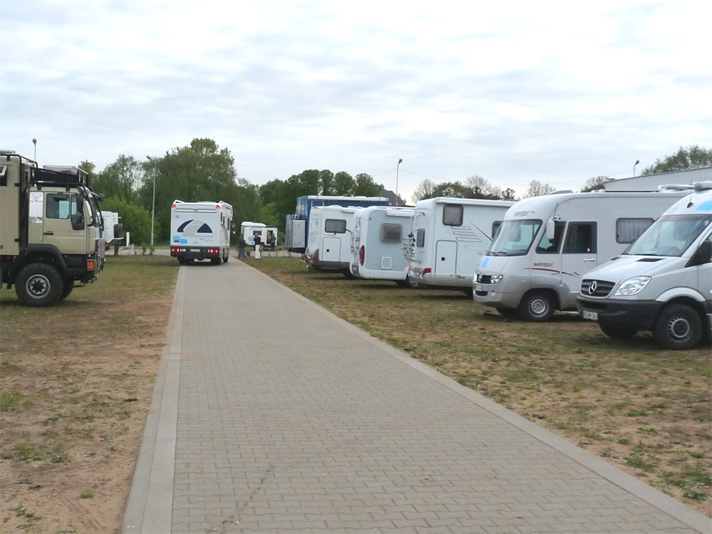 RVs parked in a basic campground.