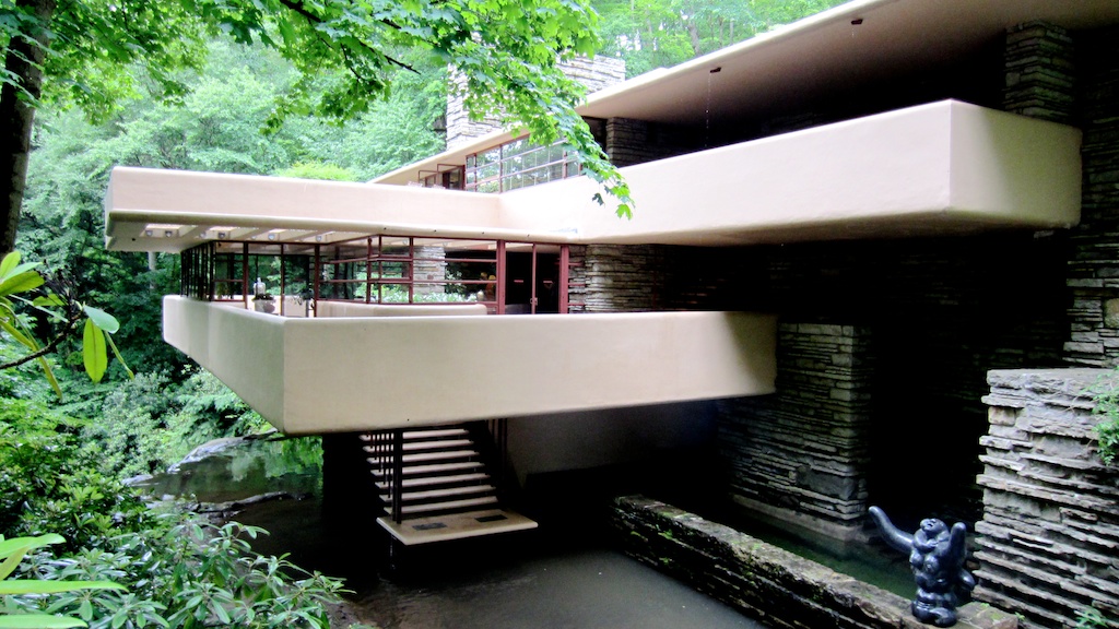 Frank Lloyd Wright home with view of the waterfall underneath the home.