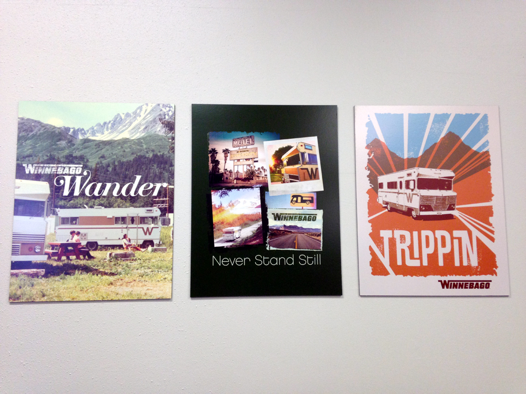 Winnebago posters hanging on the wall.