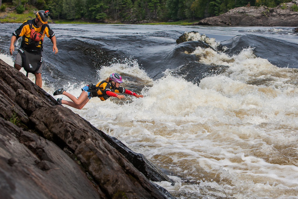 Peter watching as Abby plunges into a rapid on the Ottawa River.