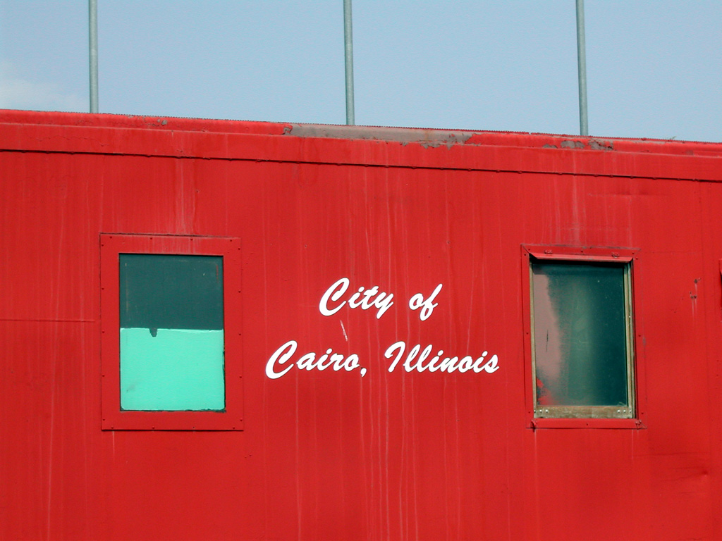 Side of a red building that reads "City of Cairo, Illinois."