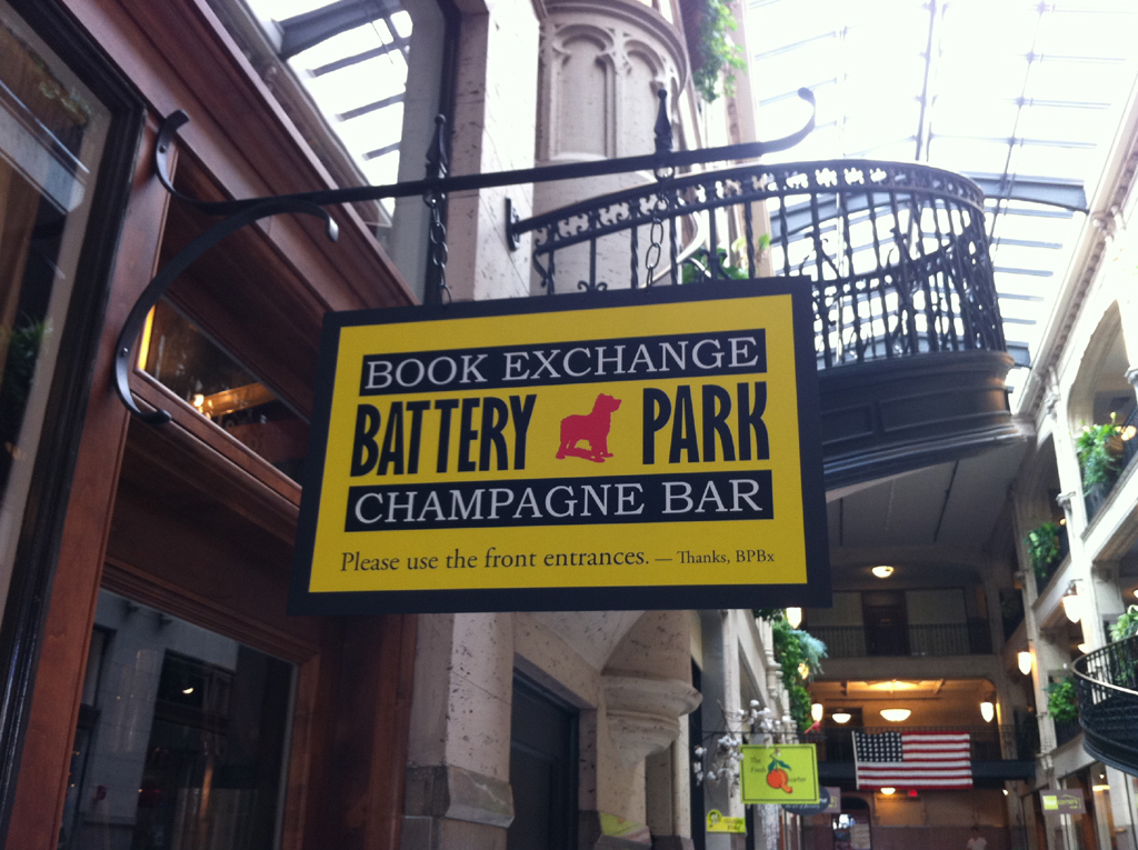 Sign for Battery Park Book Exchange & Champagne Bar.