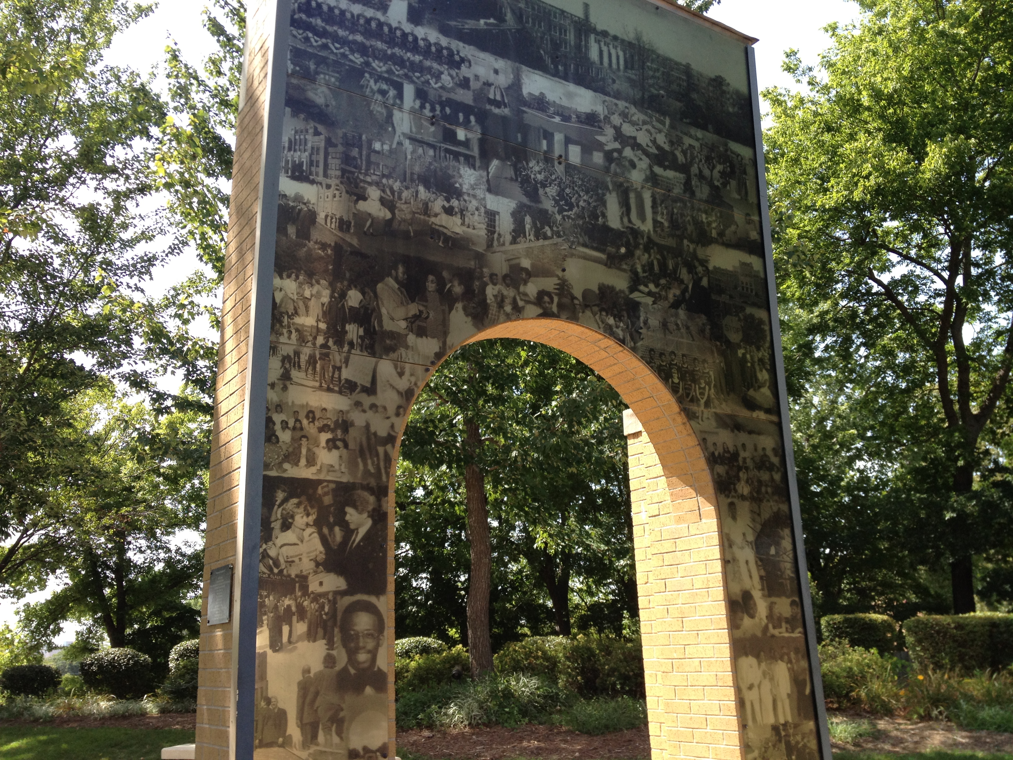 Arch with photos covering the side at Little Rock's Central High School.