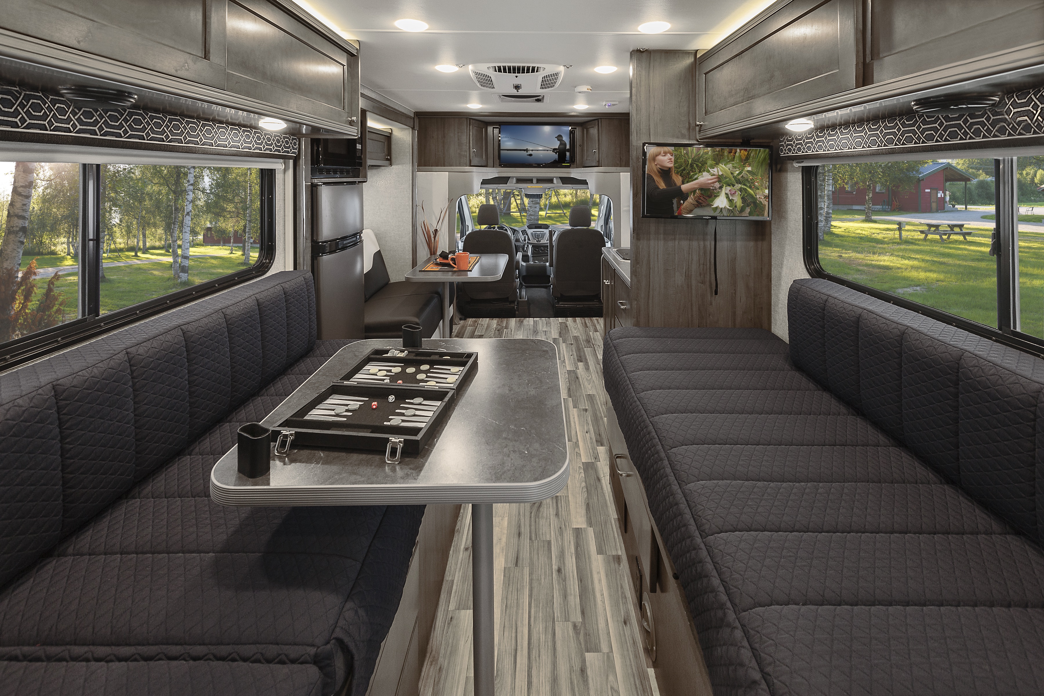 Winnebago Fuse interior twin beds, dinette, kitchen and front cab.
