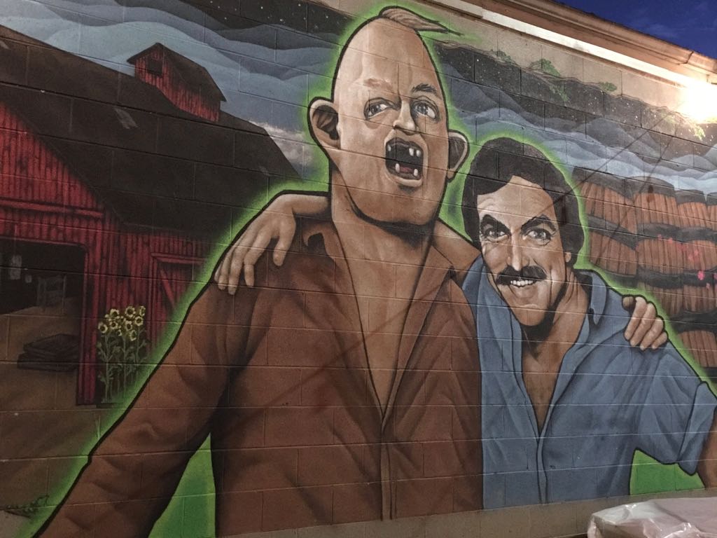Mural on wall of Sloth from the Goonies and Tom Selleck.