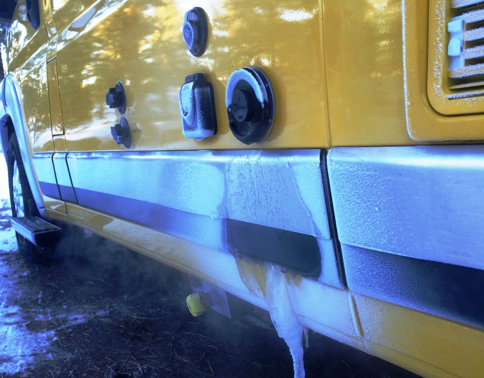 Icicles forming from condensing furnace on outside of Winnebago Travato.