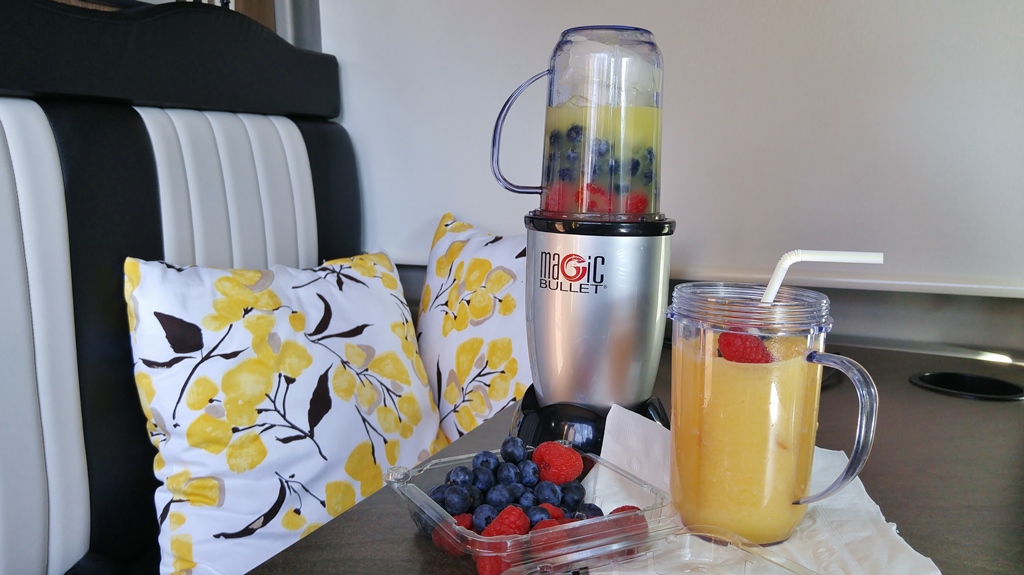 Magic Bullet, Finished drink, and blueberries and strawberries on table in Winnebago Travato.