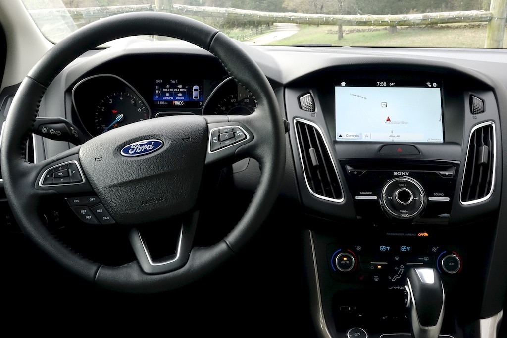 Steering wheel and dash of Ford Focus.