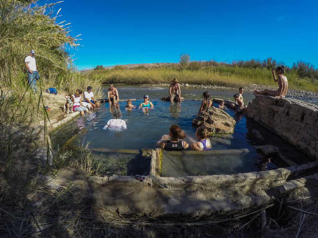 People gathered in a hot springs.