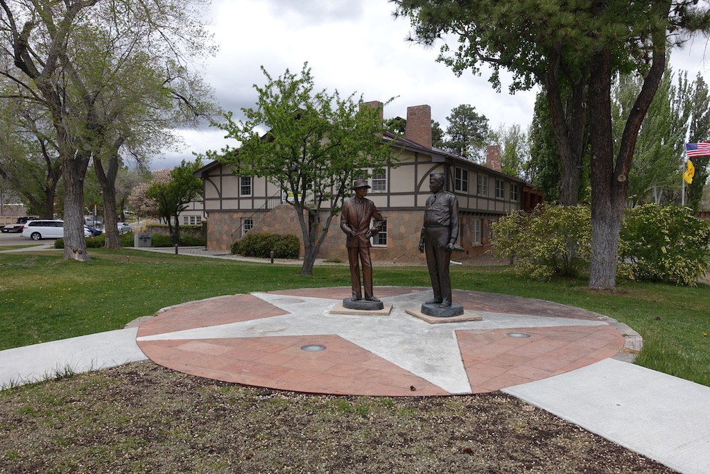 Two bronze statues of Dr. Robert Oppenheimer & General Leslie Groves.